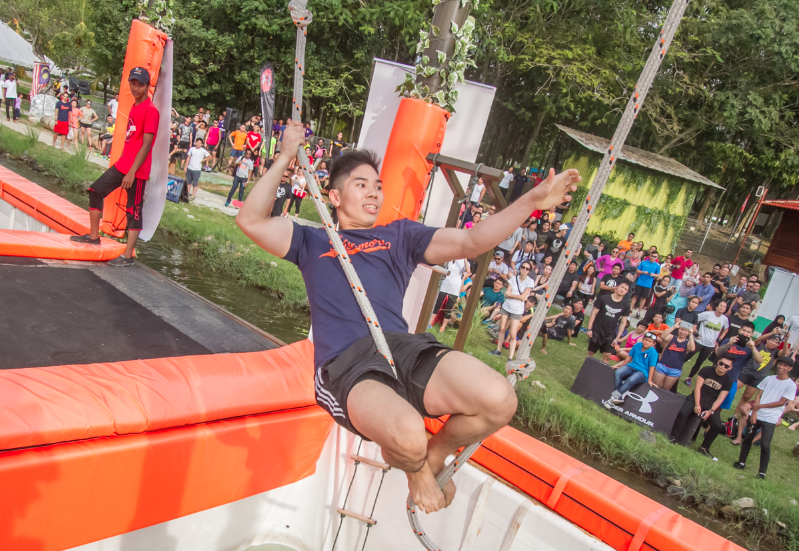 A participant puts Tarzan to shame at the Kinabatangan Swing