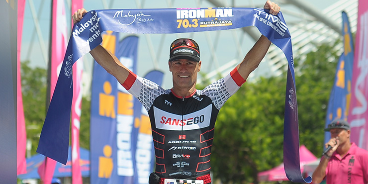 Craig 'Crowie' Alexander surges ahead to win Ironman 70.3 Putrajaya 2016. (Ironman.com)