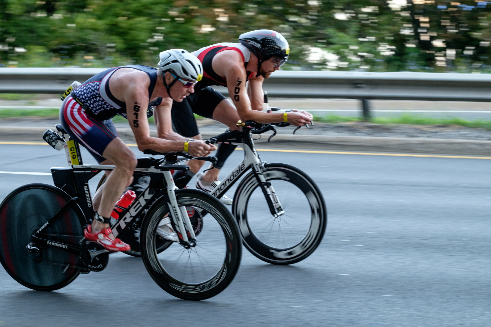 Triathletes cycled along the Henry Hudson Parkway on the New York City Triathlon race course.